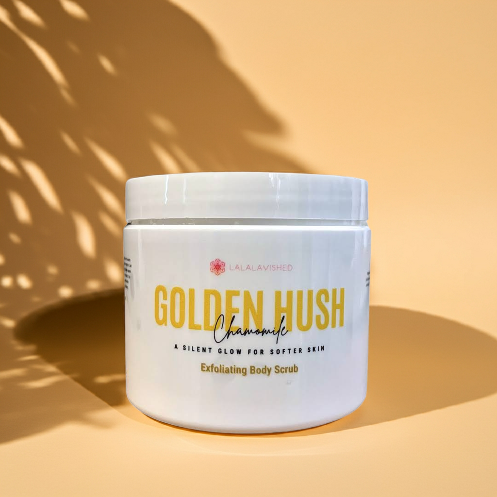 Jar of Golden Hush Chamomile Exfoliating Body Scrub on a beige background
