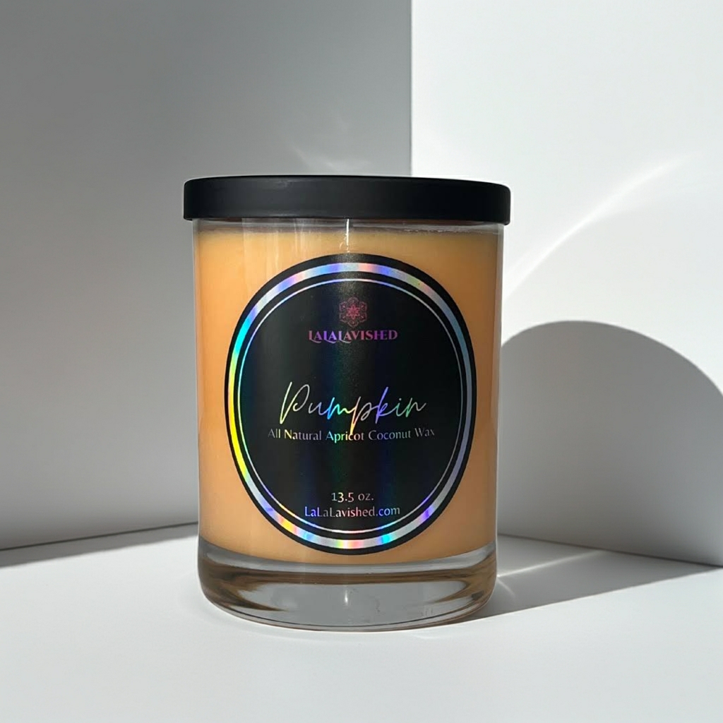 Pumpkin Candle with a colorful label on a white surface